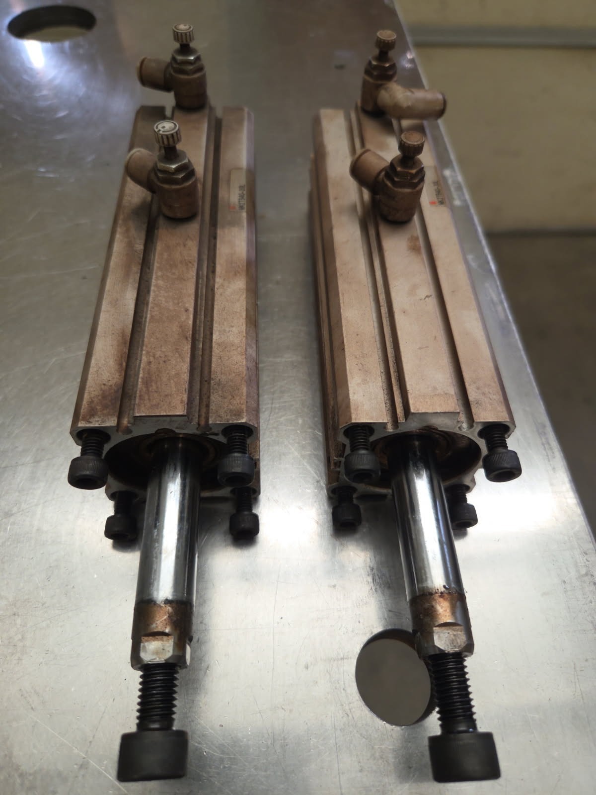 Lot of (2) used SMC MK2TB40-20L 90 degree rotational clamp cylinders