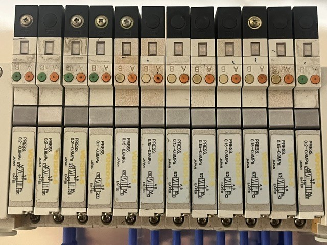SMC BANK OF SOLENOID VALVES, 7 EA VQ1101-5, 4 EA. VQ1301-5, 1 EA. VQ1201-5